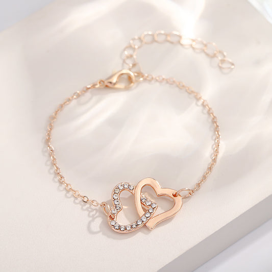Double love bracelet female sweet cool wind simple niche student hollow heart jewelry manufacturer